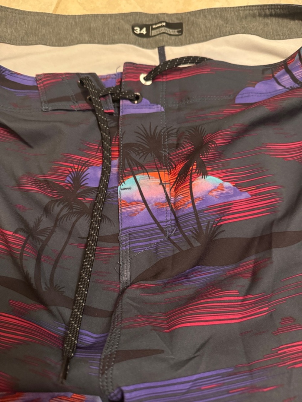 Hurley Men’s Charcoal Board Shorts with Red & Purple Sunset
